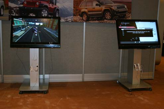 Illustration for article titled Play With It: Top Seven Examples Of Automaker-Video Game Industry Love-Making In New York